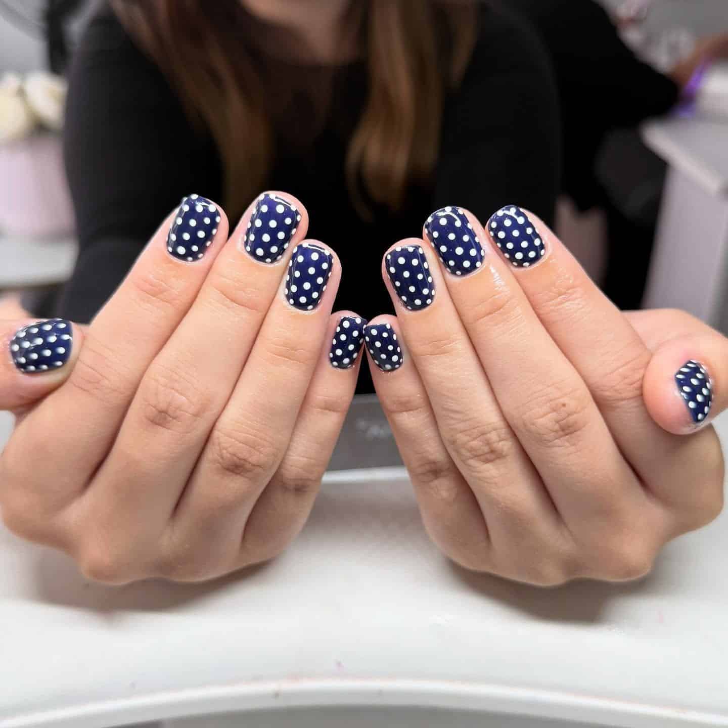 12. Classic Navy Polka Perfection - dot nail ideas