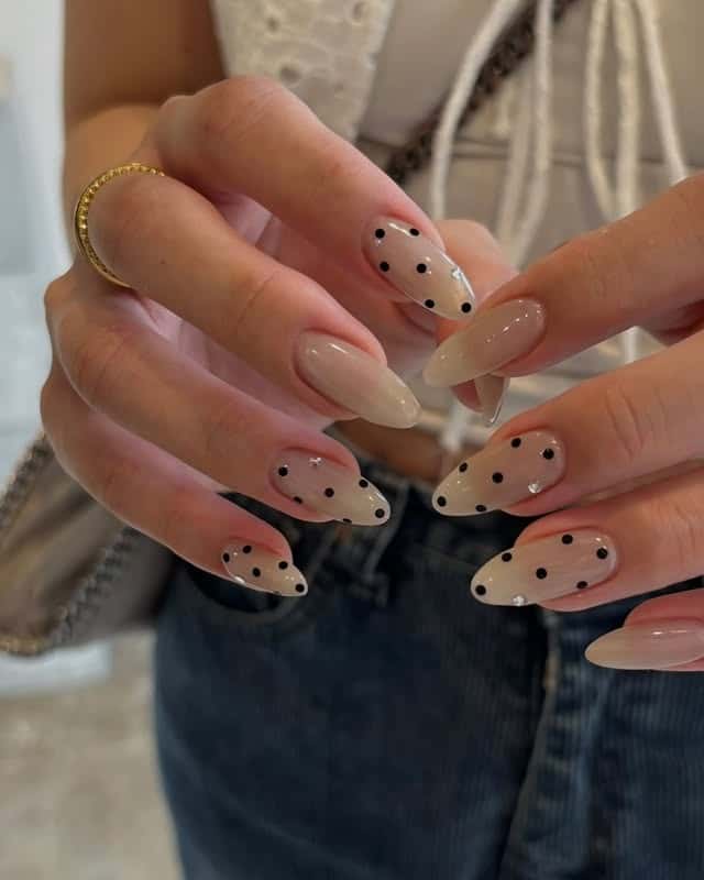 22. Neutral Almond Elegance with Black Dots - dot nail ideas