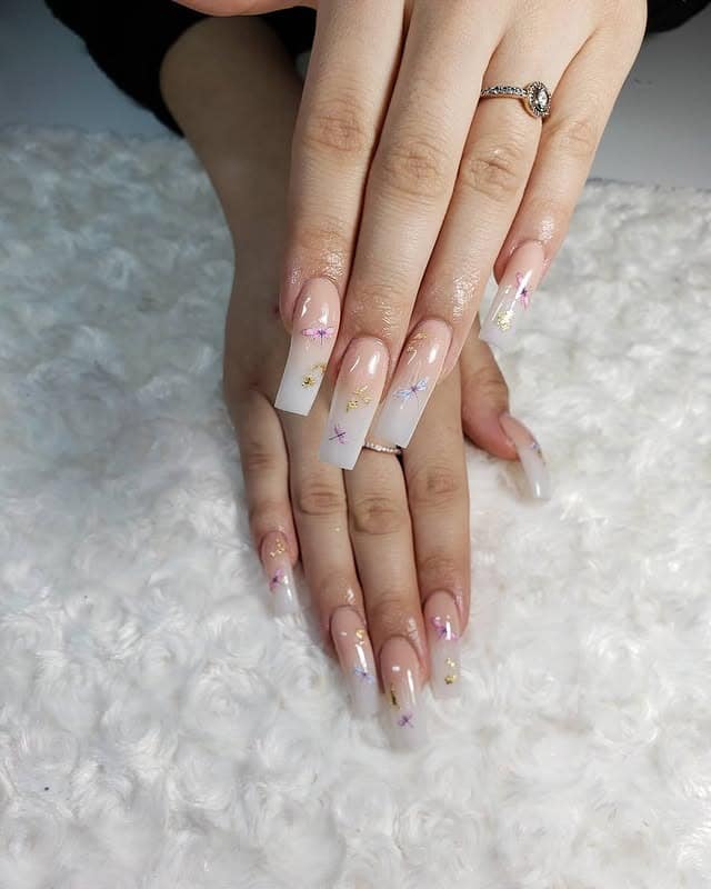 3. Ethereal Sparkle Tapered Nails - dragonfly nail ideas