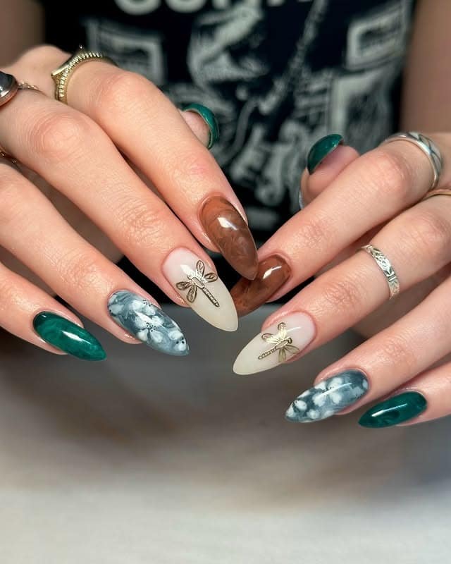 5. Earthstone Marble Dragonfly Nails - dragonfly nail ideas