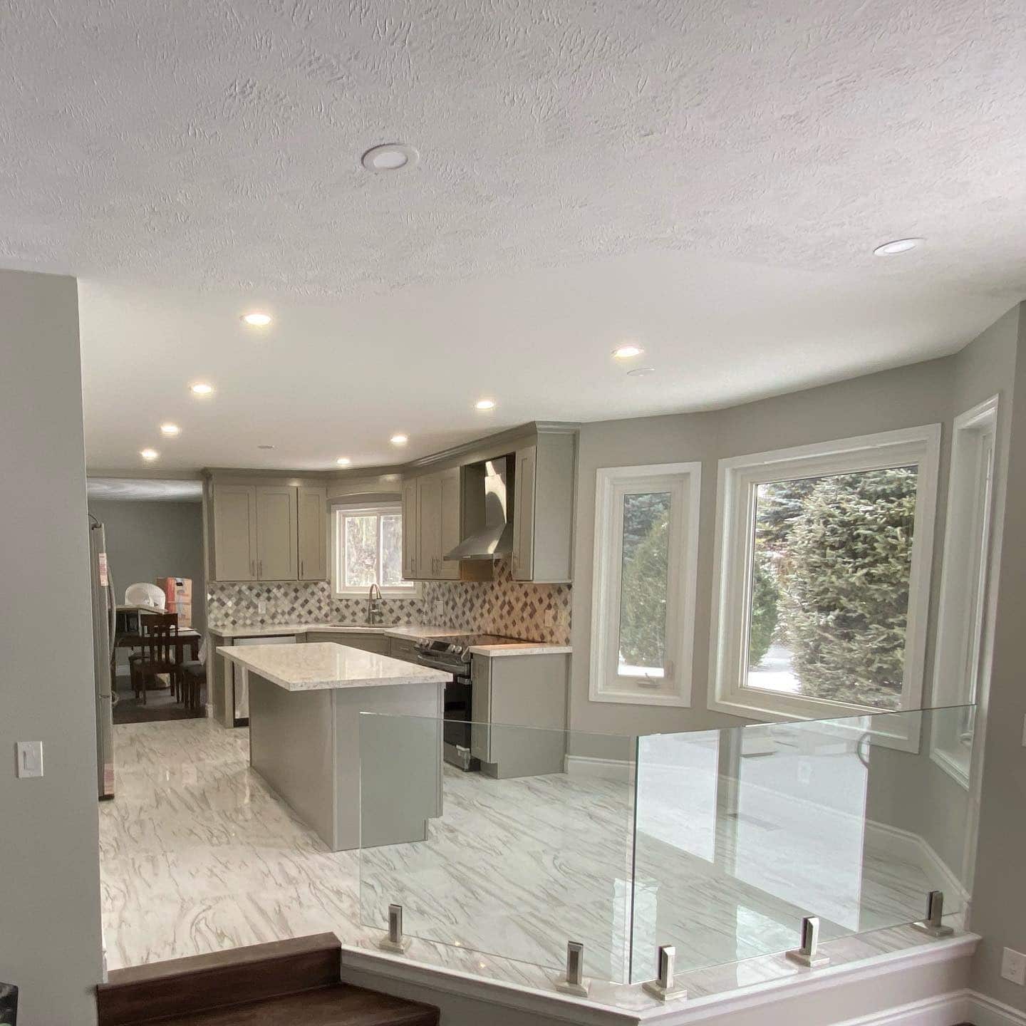 13. Soft Geometry in Gray and Taupe Mosaic - gray kitchen backsplash ideas