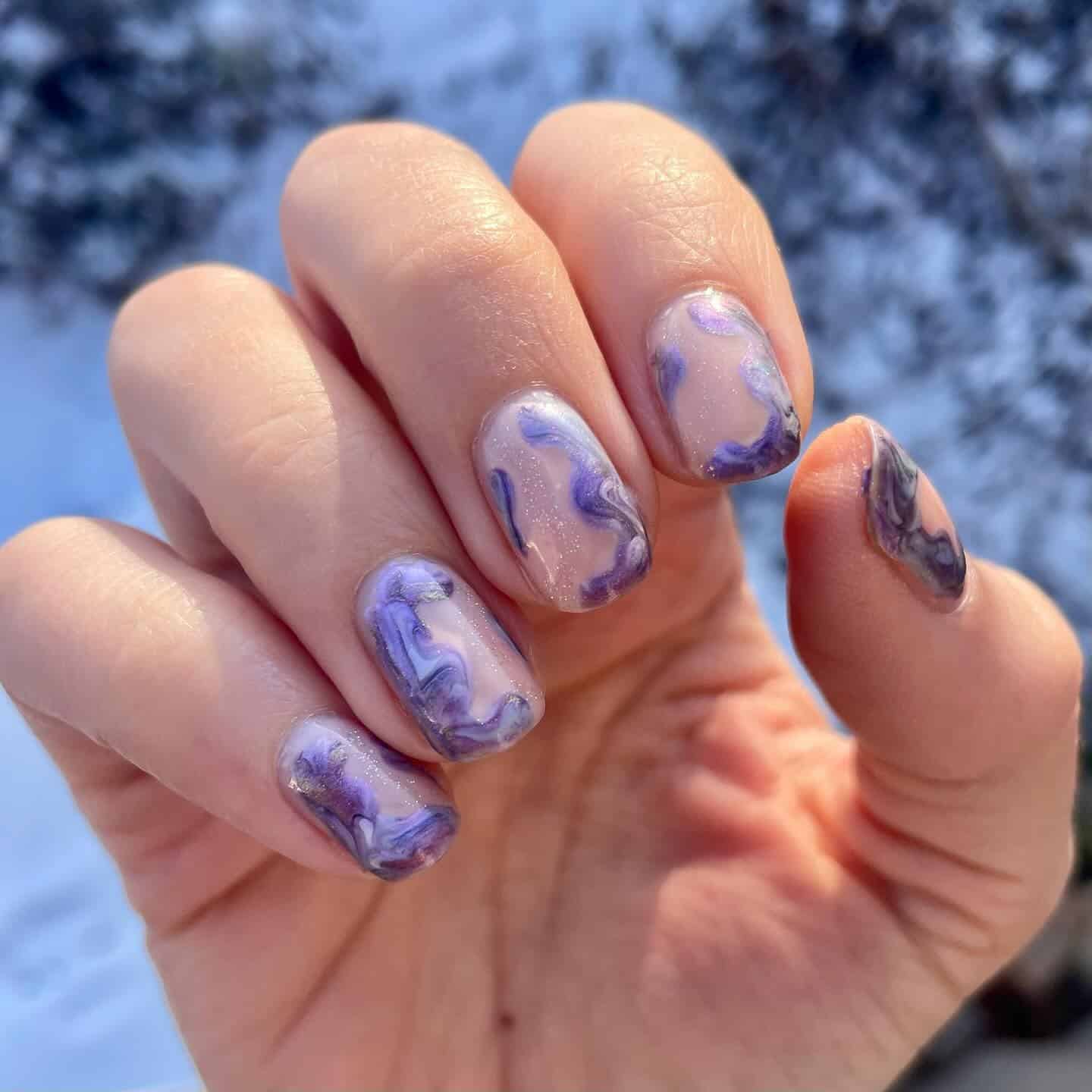 5. Lavender Marble Ice Design - easy winter nail ideas