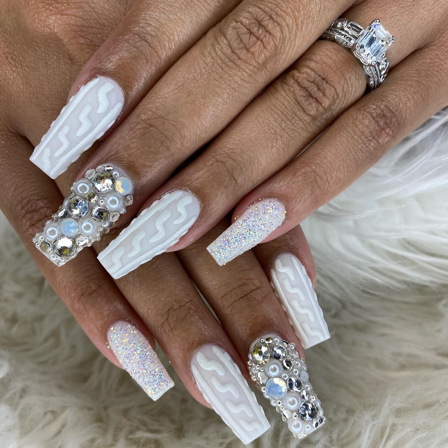 10. Snow Queen White with Crystal Embellishments - easy winter nail ideas