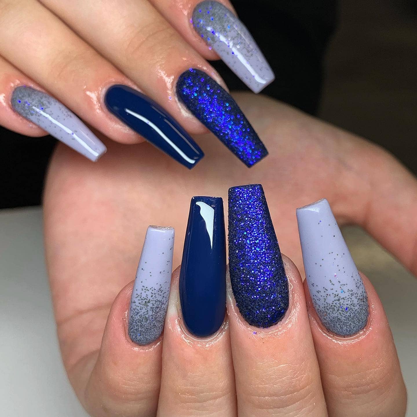 13. Midnight Sparkle Ombre Blend - easy winter nail ideas