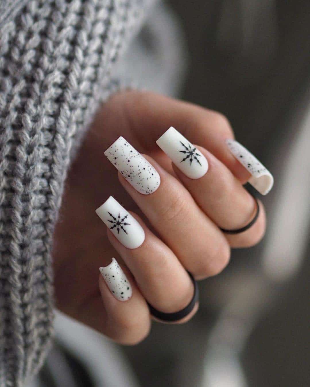 19. Speckled Snow and Star Accents - easy winter nail ideas