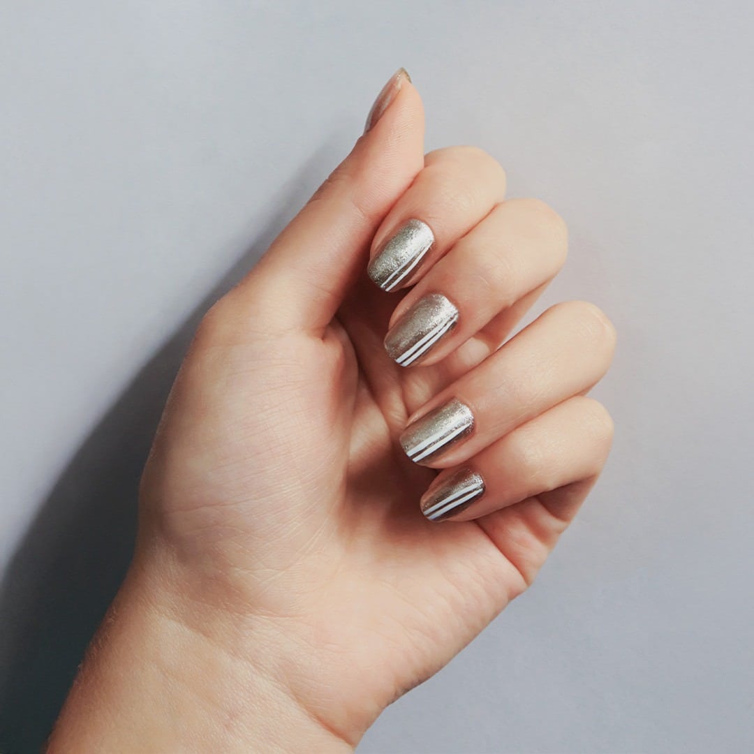 21. Silver Chrome with Sleek Stripes - easy winter nail ideas