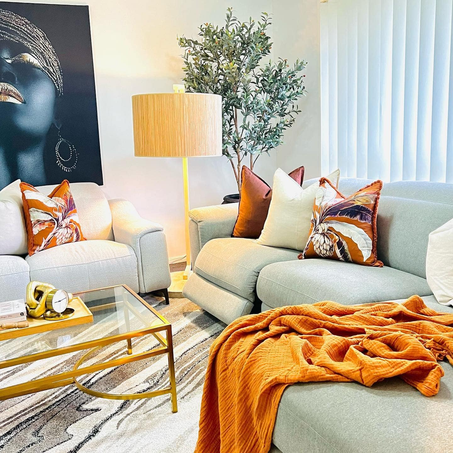 4. Modern Glam with Burnt Orange and Gold - small living room ideas