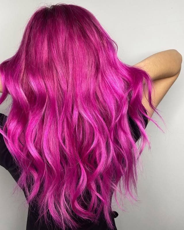 6. Electric Fuchsia Waves with Length and Shine - Dark Pink Hair Color