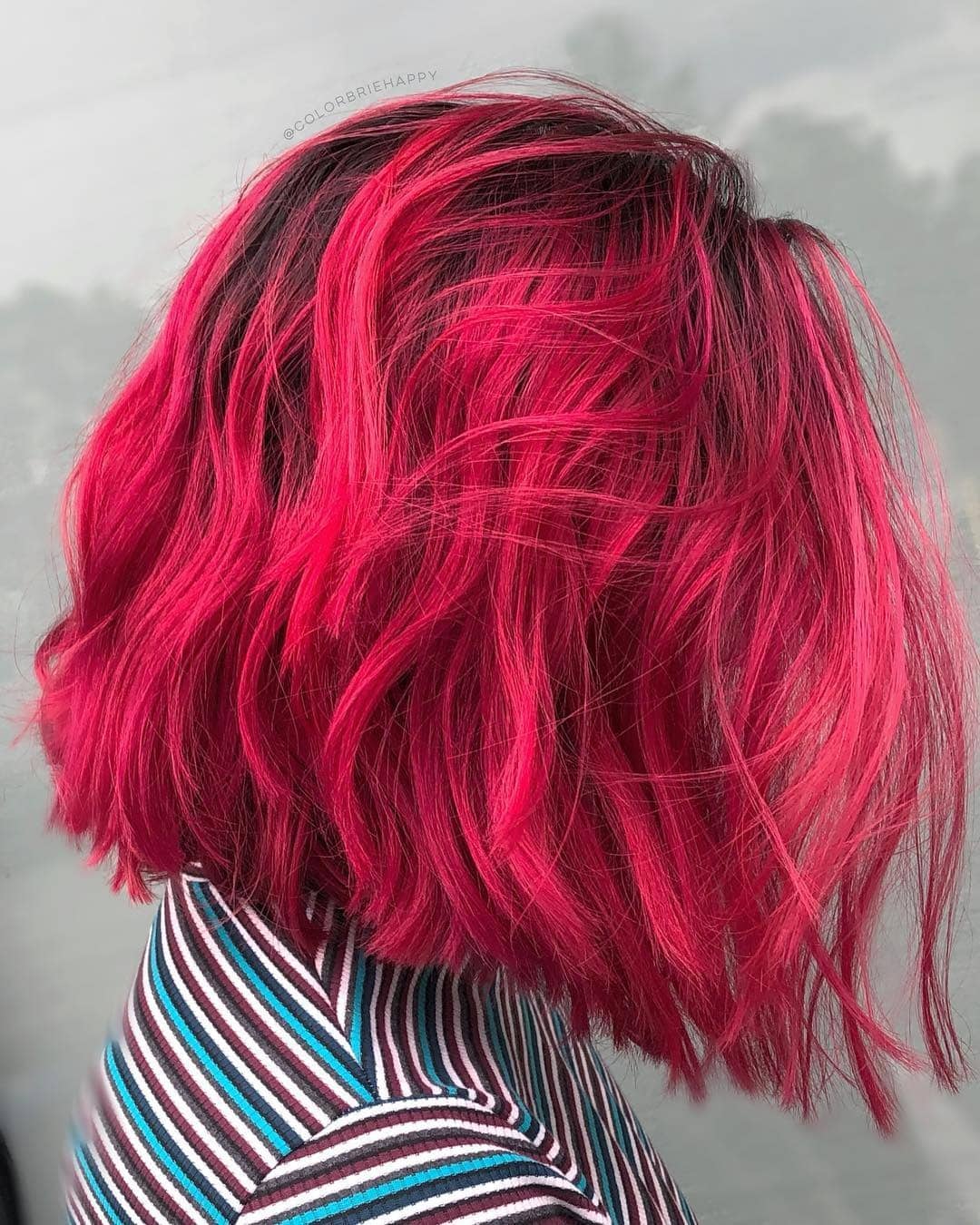 7. Choppy Neon Rose Bob with Volume - Dark Pink Hair Color