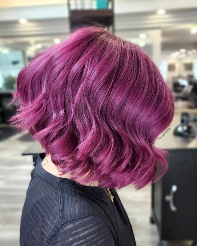 13. Plum Orchid Bob with Sculpted Texture - Dark Pink Hair Color
