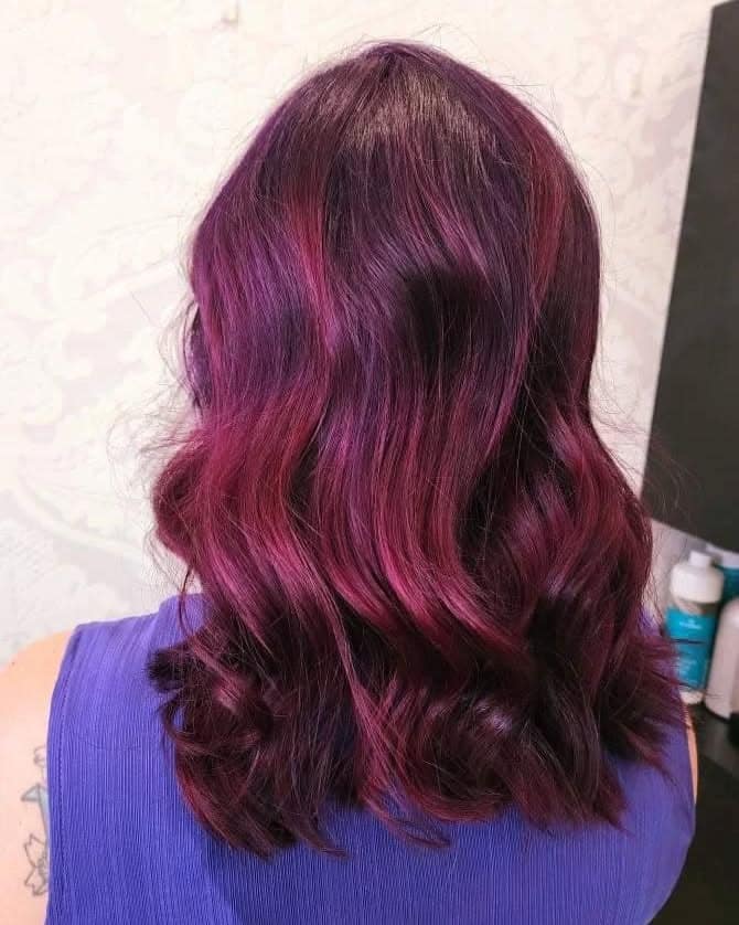 21. Plum Radiance with Soft Mid-Length Curls - Dark Pink Hair Color