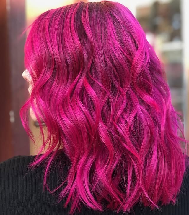 22. Electric Fuchsia Waves with Dimensional Glow - Dark Pink Hair Color