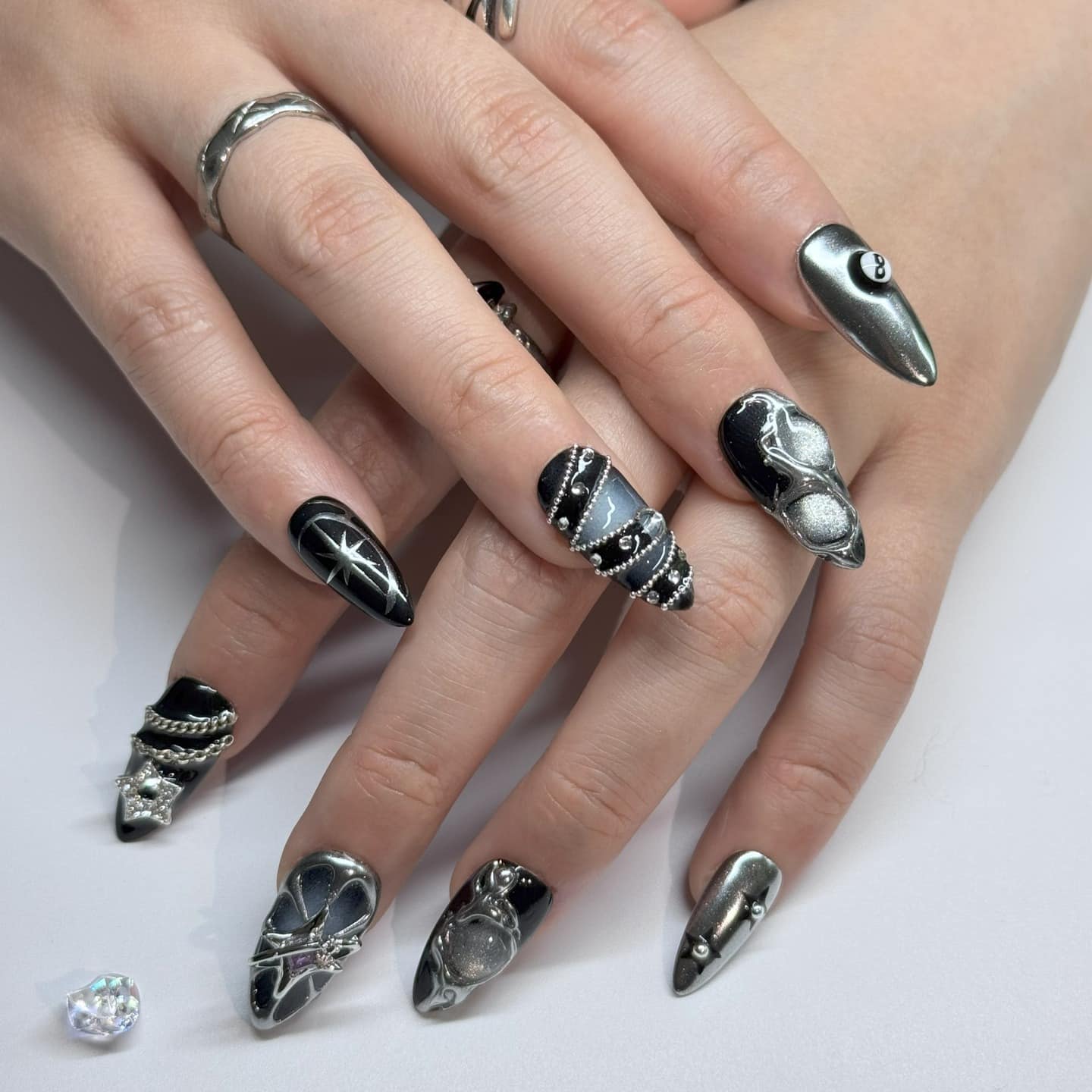 5. Metal Noir Dimension - edgy nail ideas