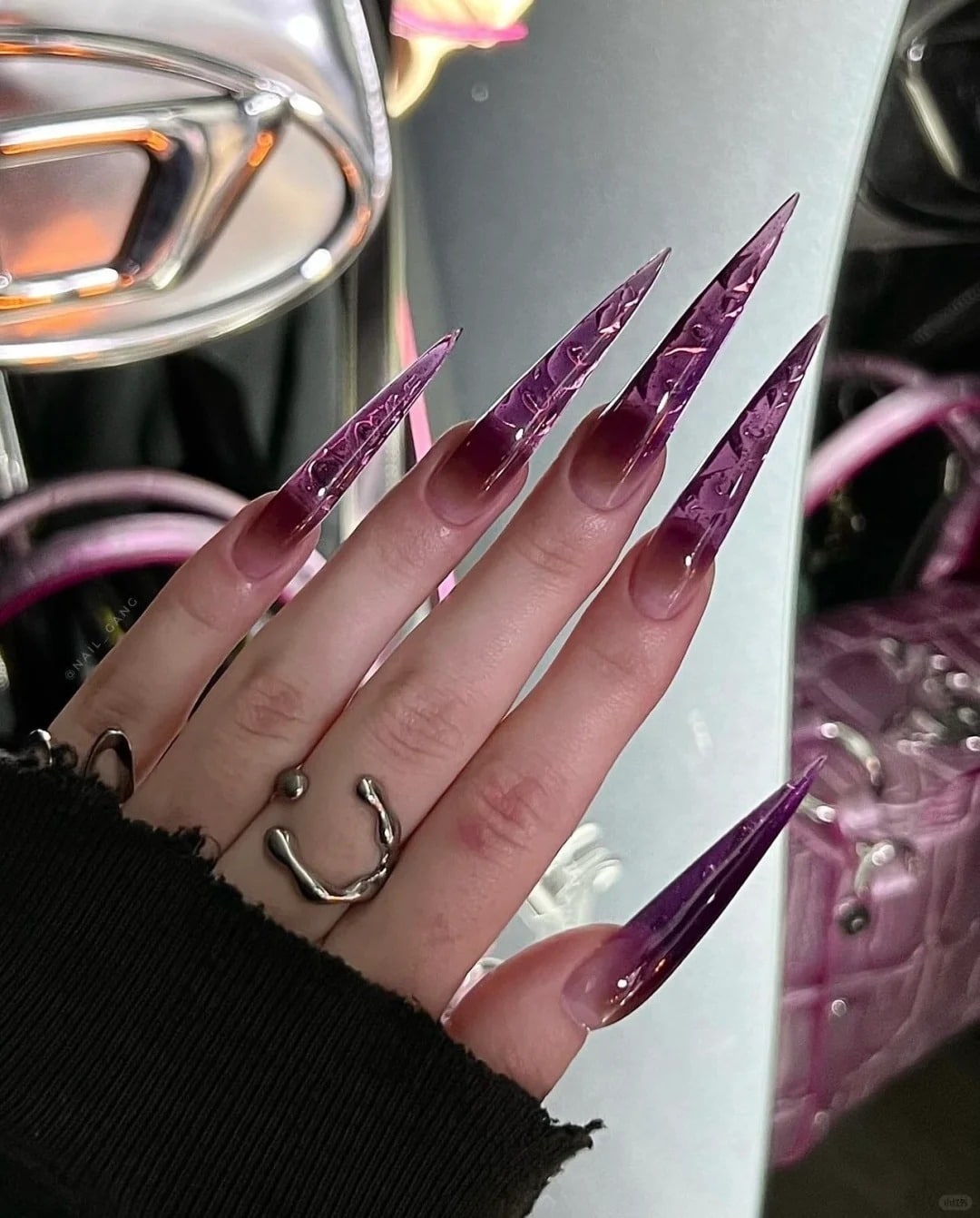 9. Violet Edge Stiletto - edgy nail ideas