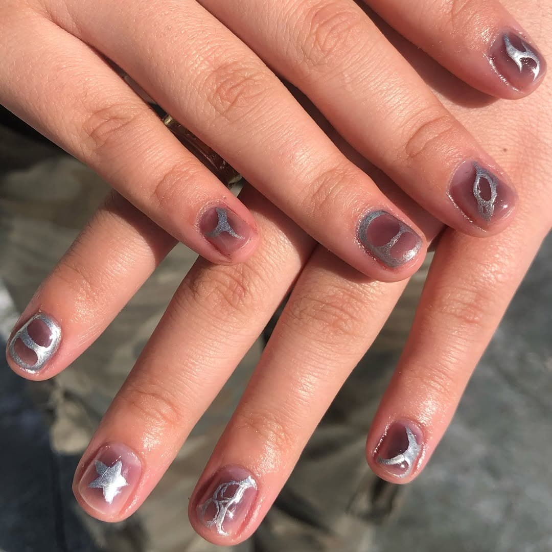 16. Lunar Chrome Aura - edgy nail ideas