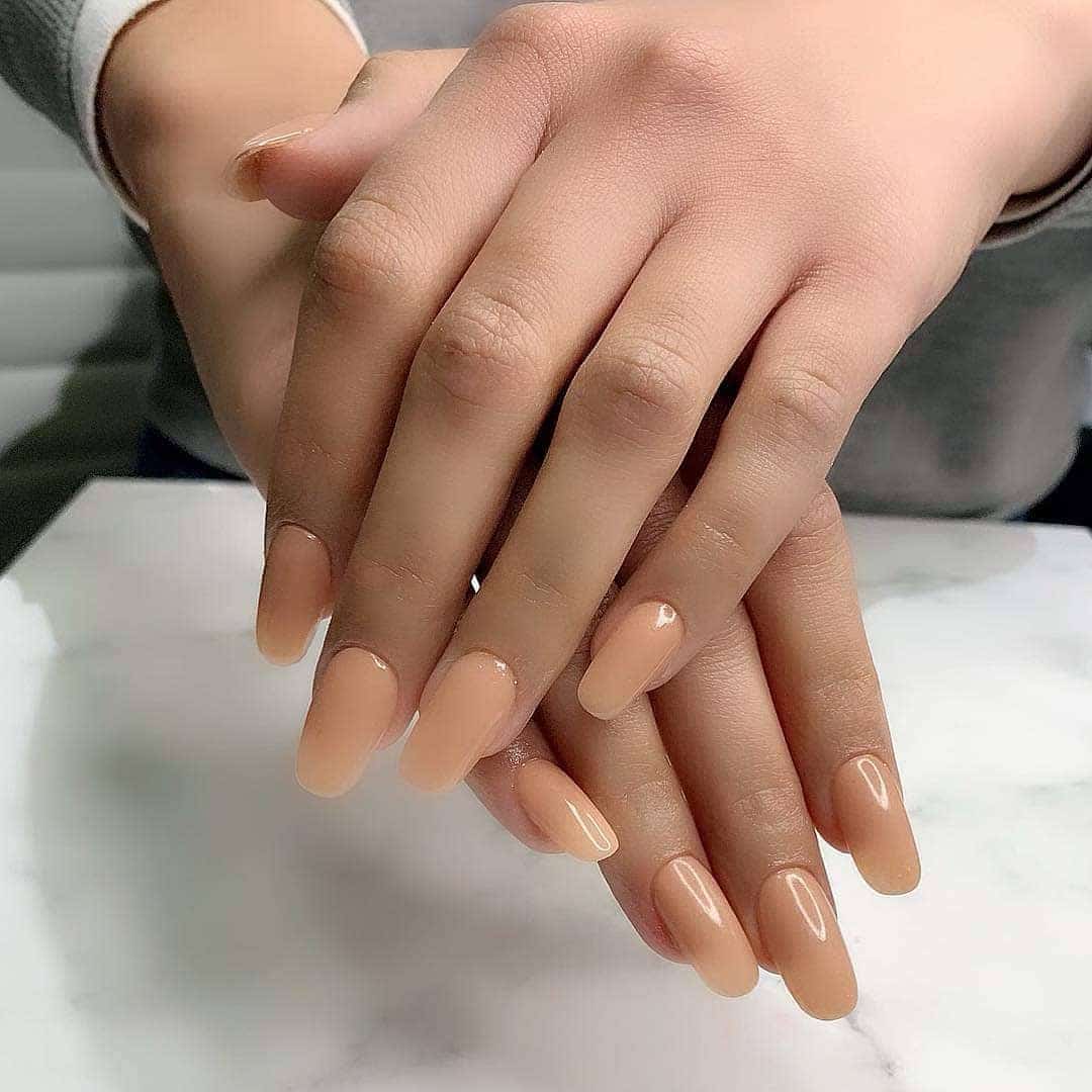 1. Classic Nude Elegance - exotic nail ideas