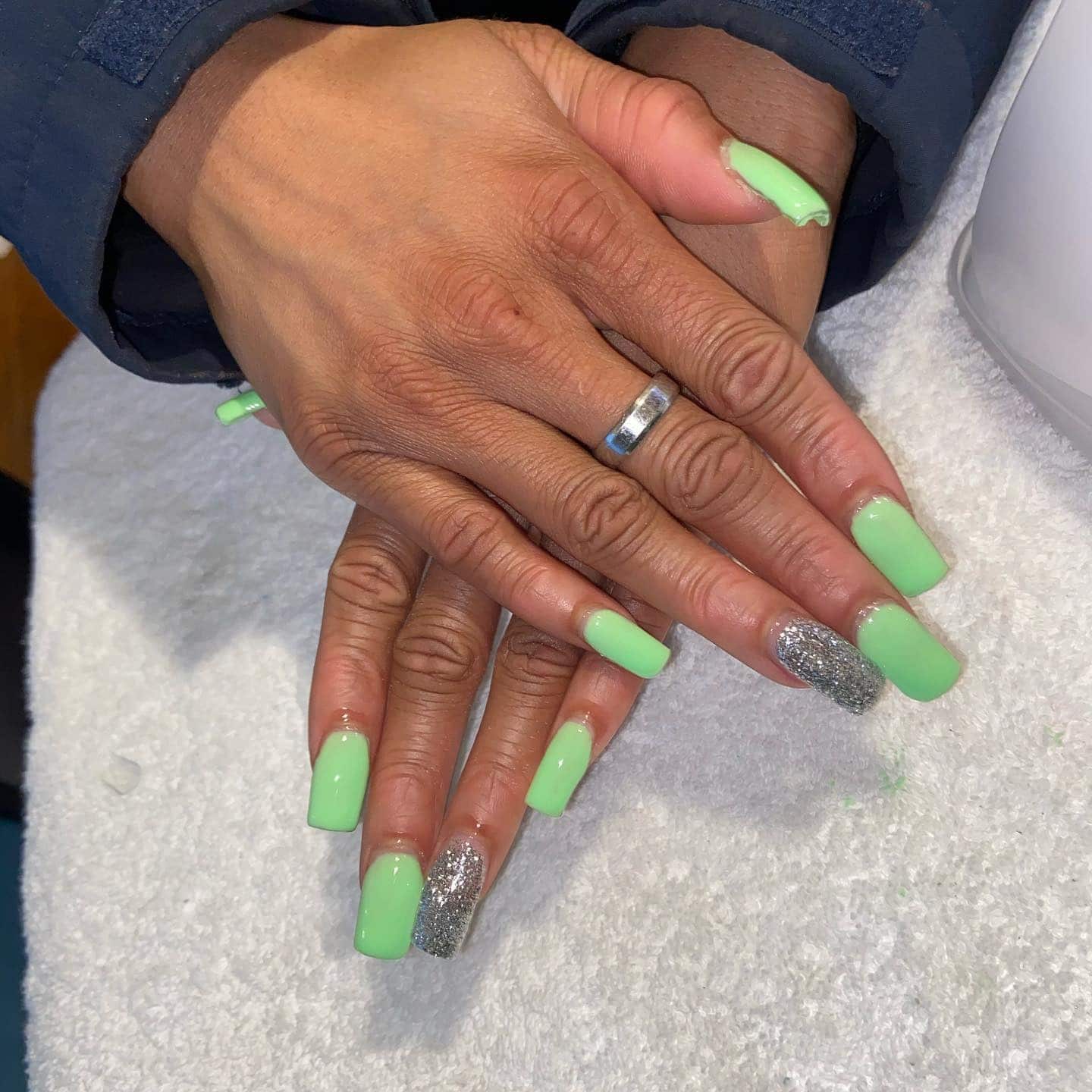 8. Mint & Silver Charm - exotic nail ideas