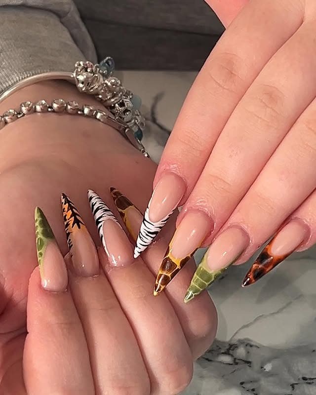 21. Wild Safari Stiletto Nails - exotic nail ideas