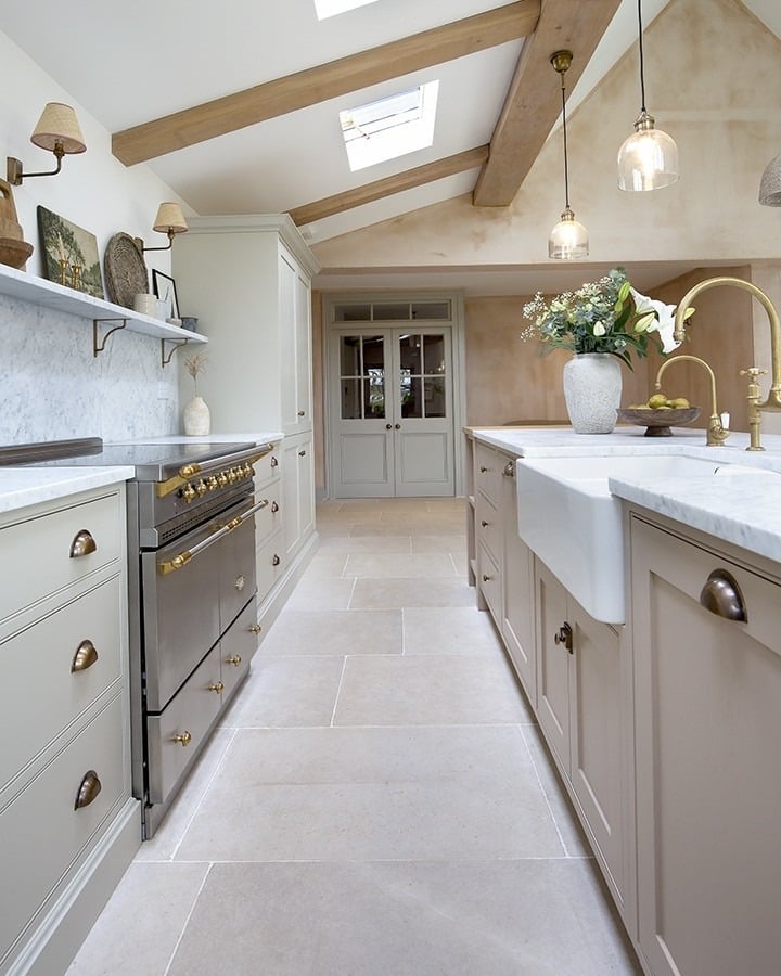 12. Soft Stone & Brass Harmony - neutral kitchen ideas