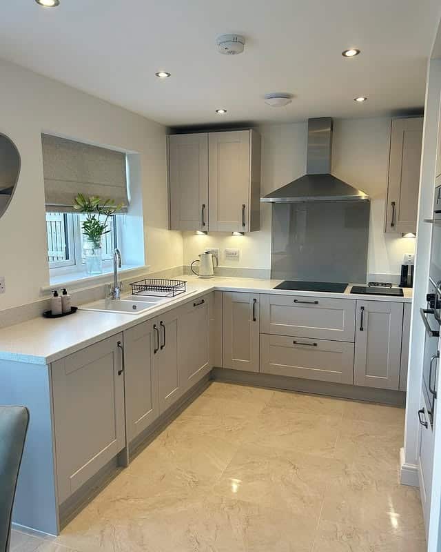 16. Cool Taupe Efficiency - neutral kitchen ideas