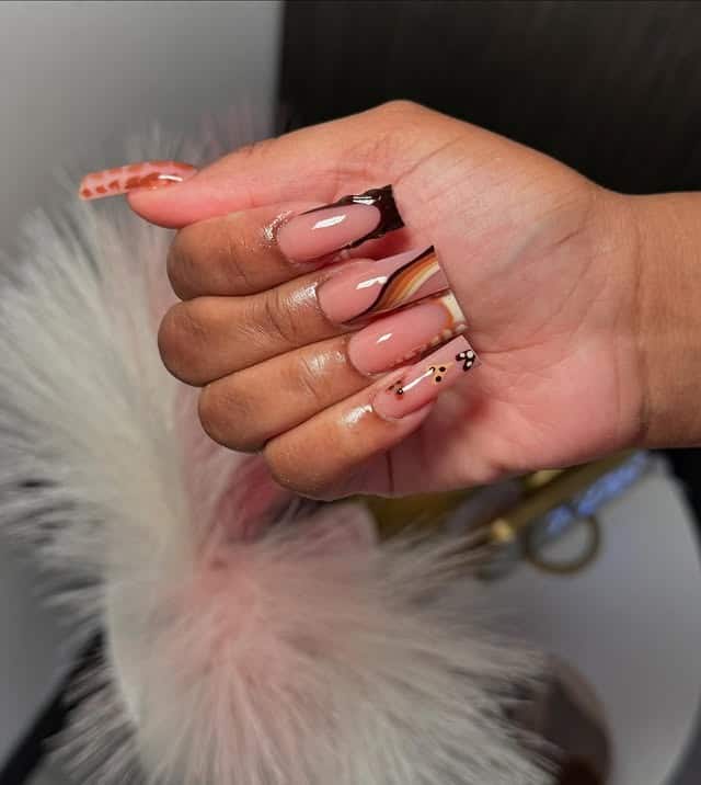 2. Neutral Swirl & Floral Accent Coffin Nails - fall coffin nail ideas