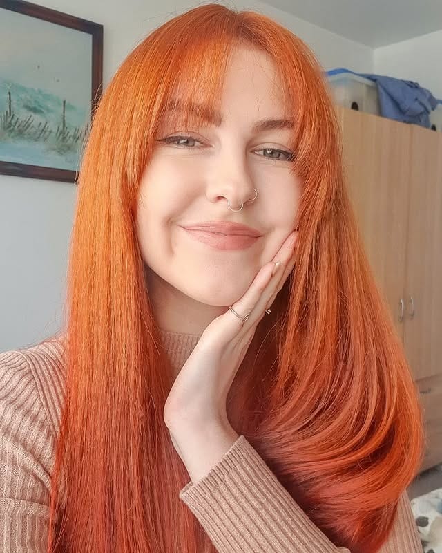 3. Sleek Straight Fringe – Fiery Copper Radiance - Fringe Hairstyles