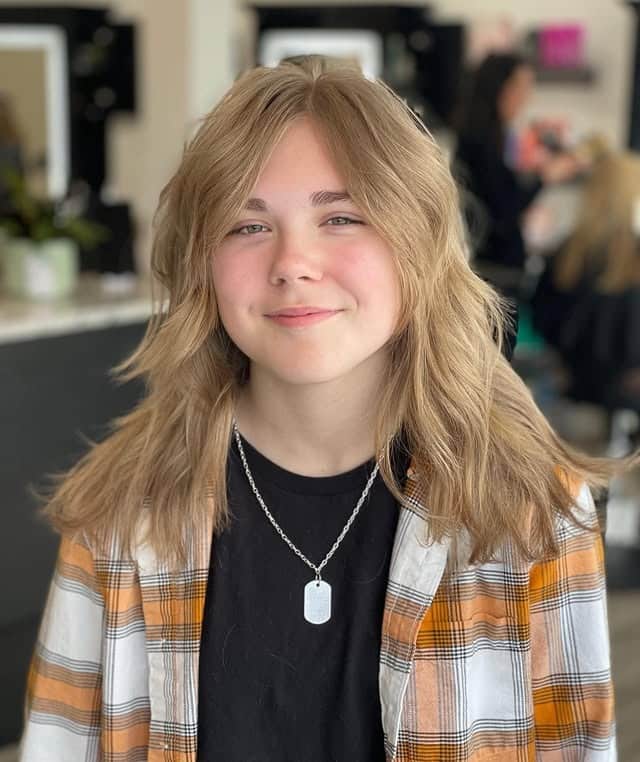 4. Shaggy Mid-Length with Feathered Fringe – Honey Blonde Glow - Fringe Hairstyles