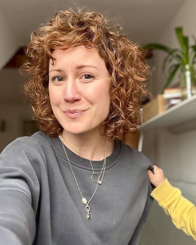 6. Curly Crop with Tousled Fringe – Warm Copper Delight - Fringe Hairstyles