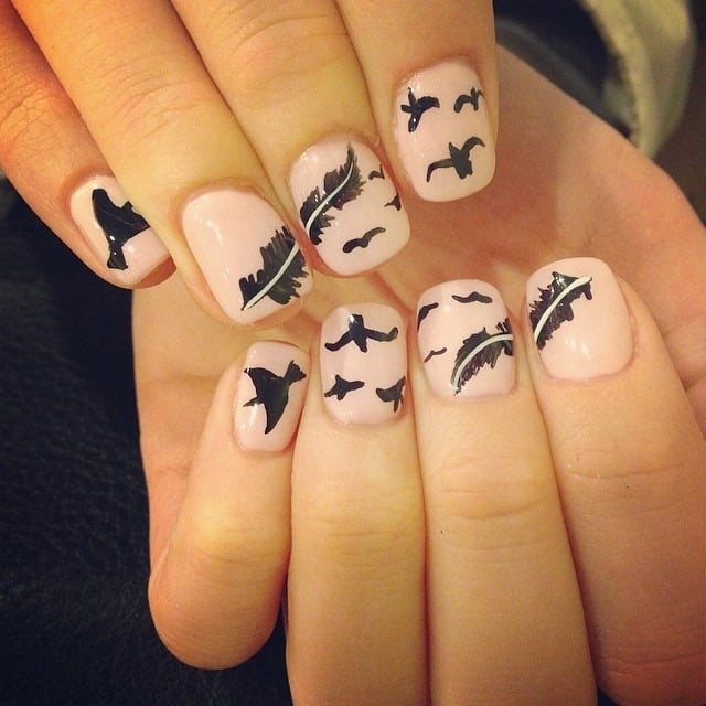 8. Flight of Freedom Nail Art - feather nail ideas