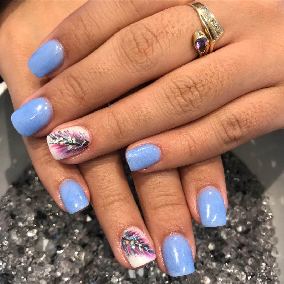 12. Sky Feather Shimmer Nails - feather nail ideas