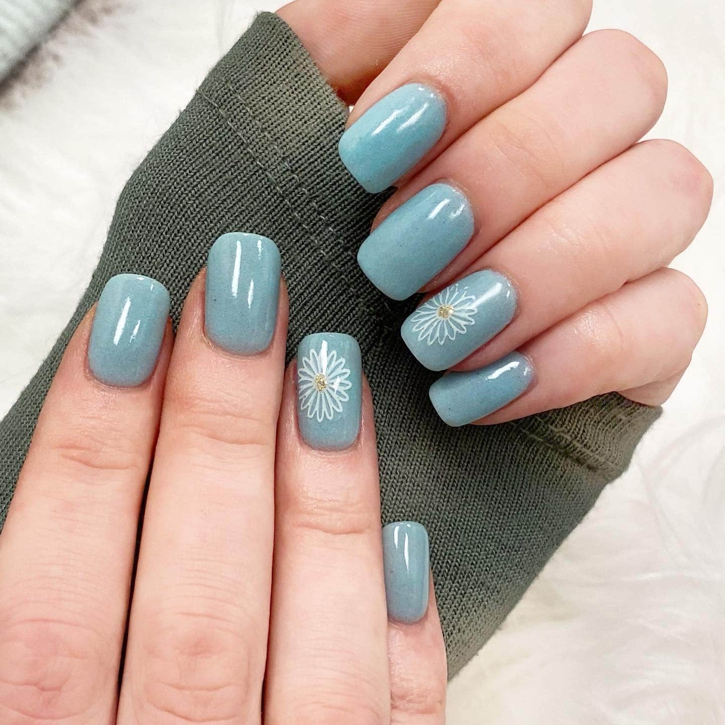 18. Dusty Blue Petal Nails - feather nail ideas
