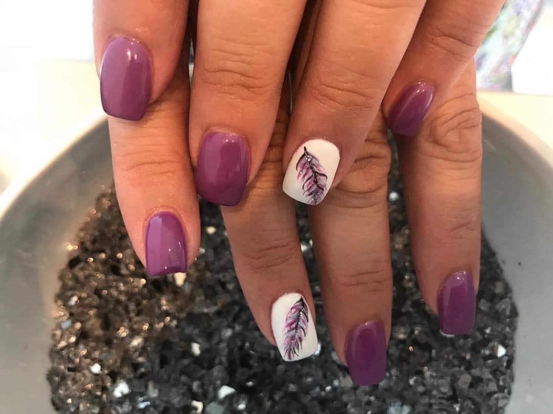19. Amethyst Feather Accent Nails - feather nail ideas