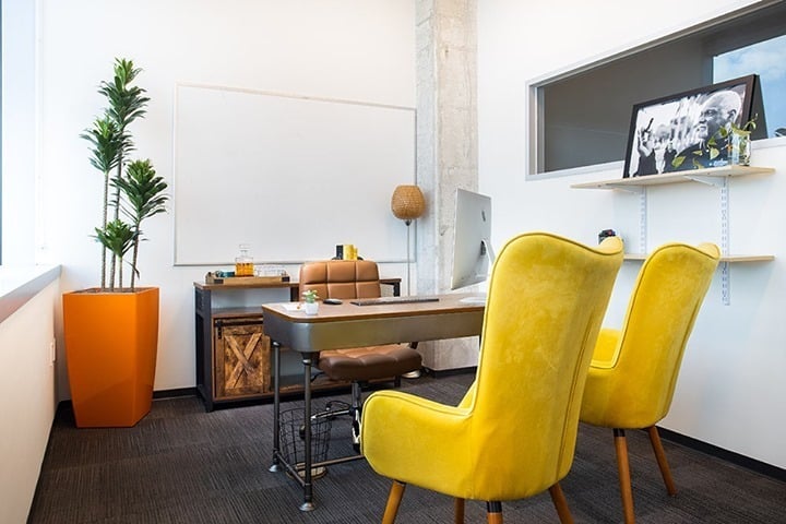8. Playful Modern Office with Bold Yellow Accents - bright office ideas