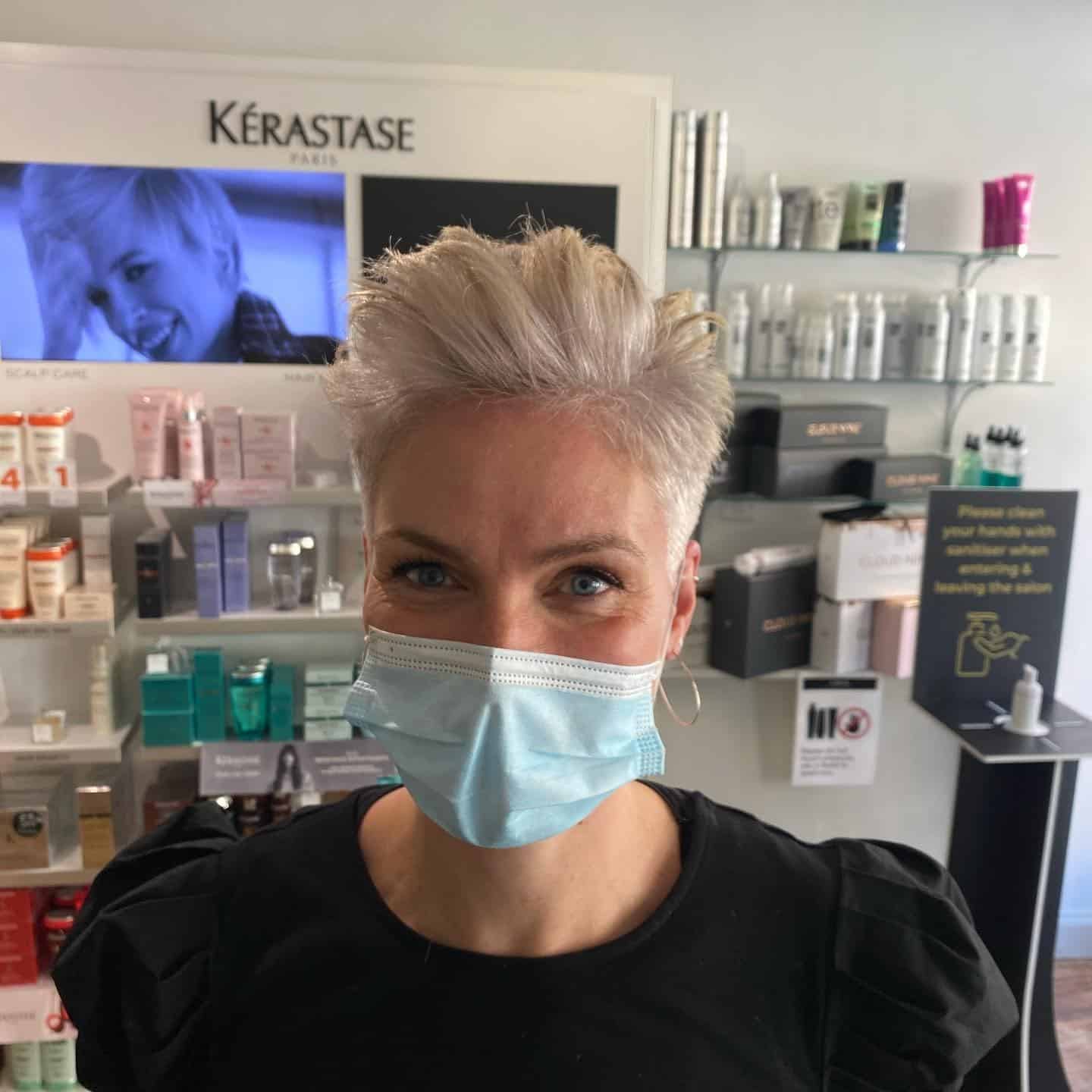 11. Icy Platinum Pixie with Volume Lift - Short Choppy Hair