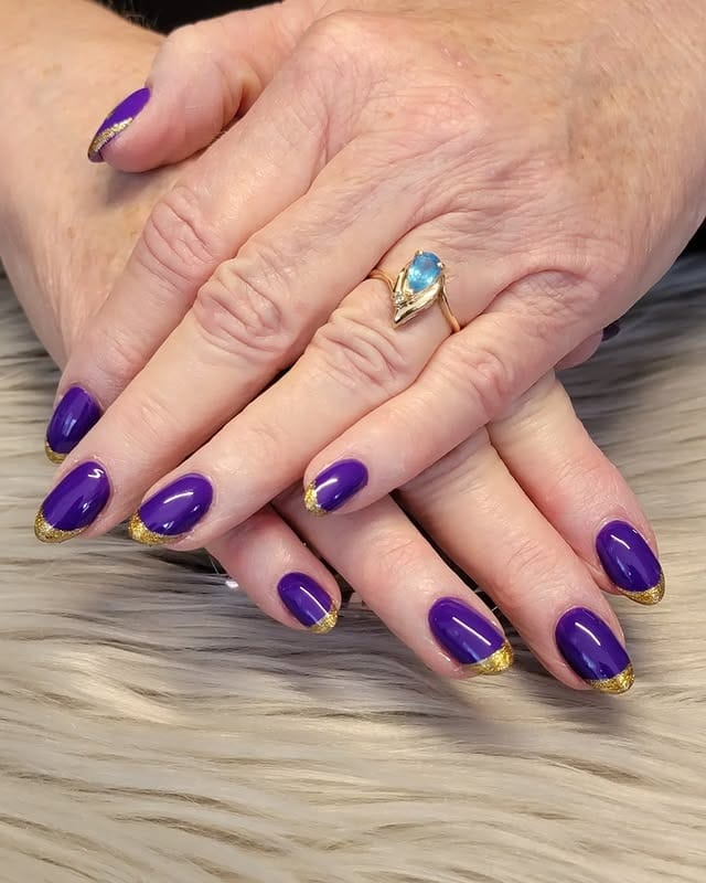 5. Classic Purple Elegance with Gold Edge - gold and purple nail ideas