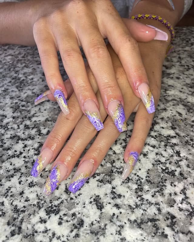 6. Marble Mist with Gold Leaf Elegance - gold and purple nail ideas