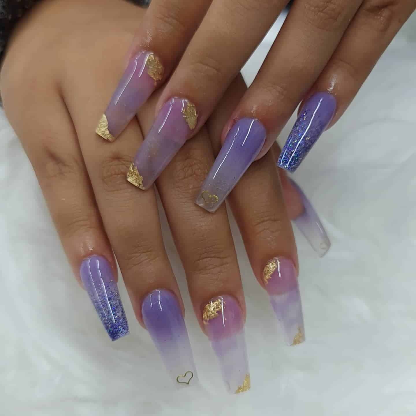 8. Ombre Lilac Radiance with Gold Touches - gold and purple nail ideas