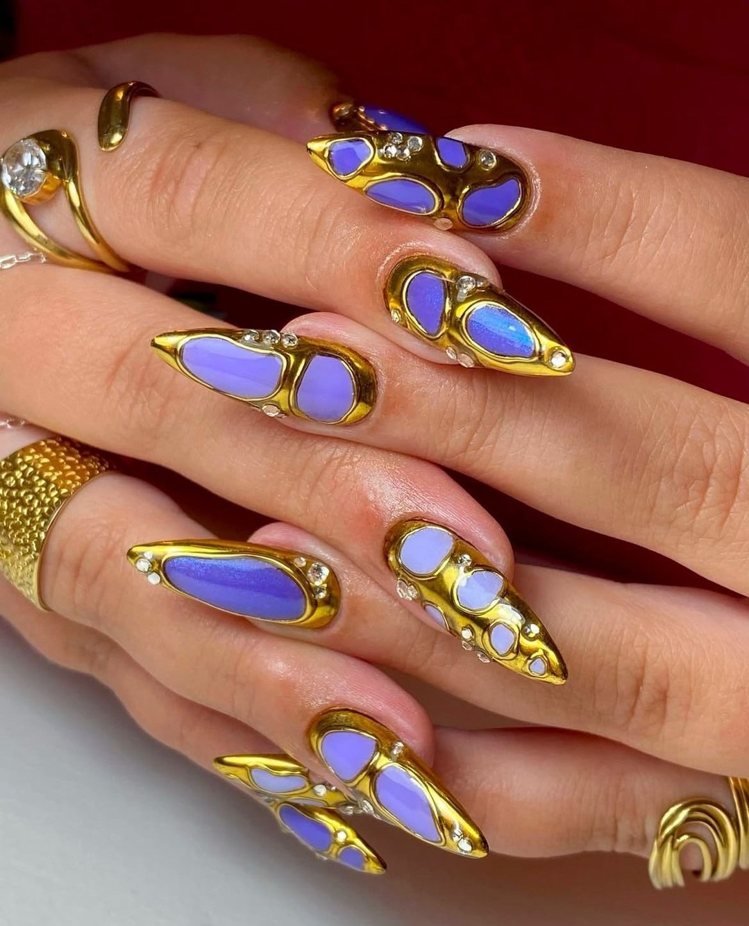 10. Golden Sculpted Lavender Armor - gold and purple nail ideas