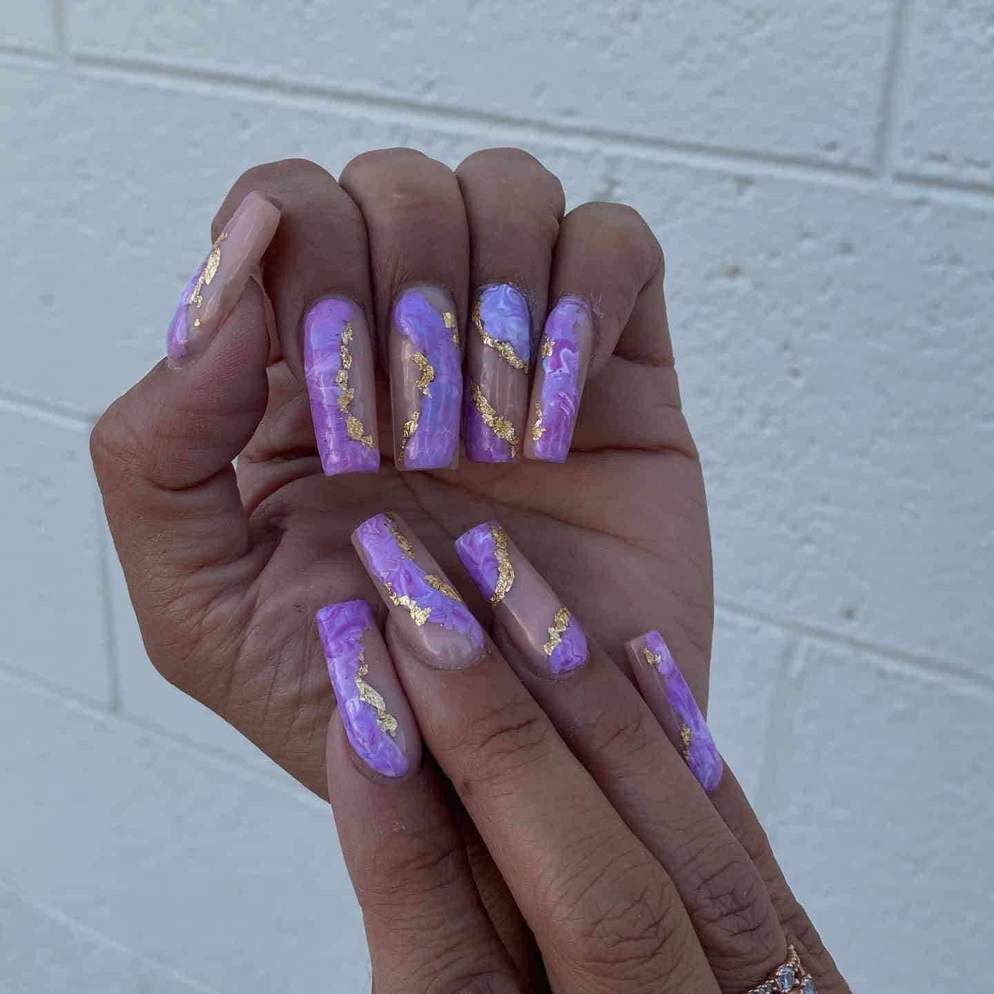 14. Marble Lilac Canvas with Gold Veins - gold and purple nail ideas