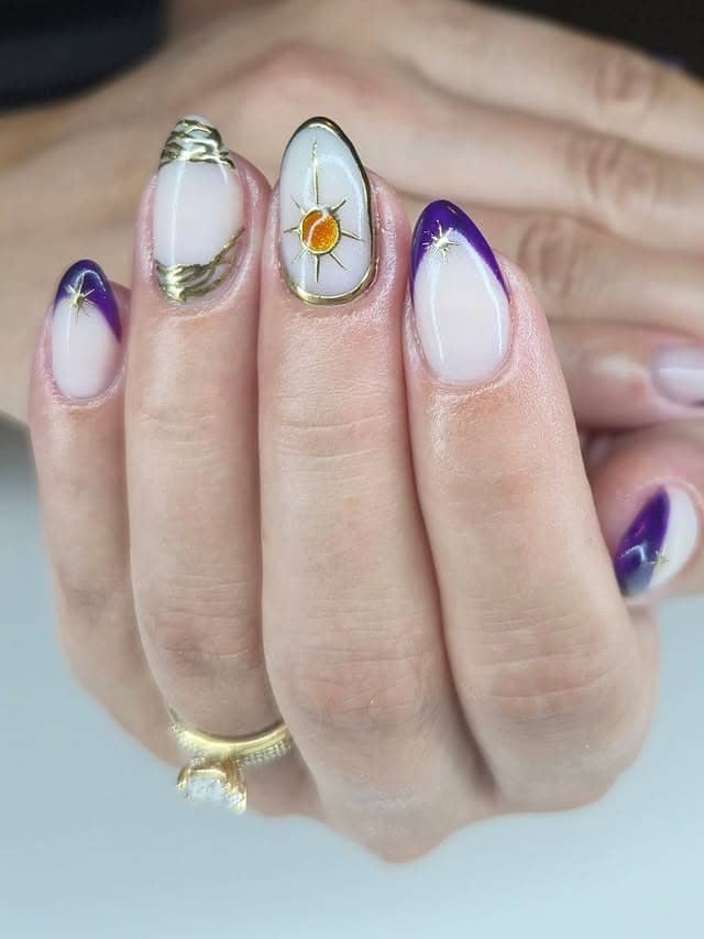 20. Golden Solar Eclipse Design - gold and purple nail ideas