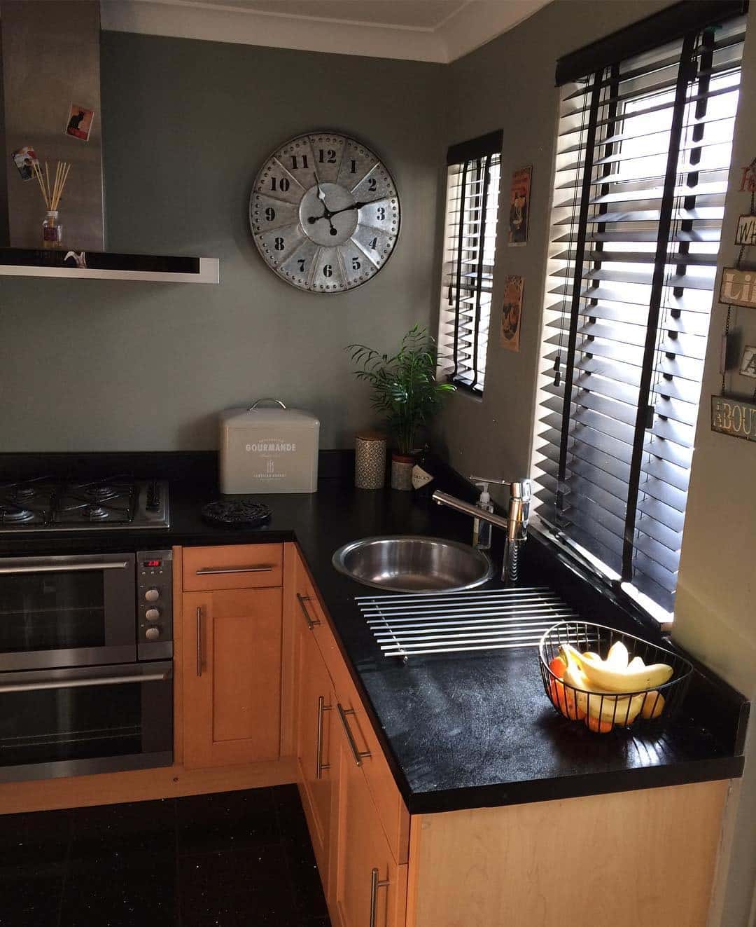 14. Olive Modern Compact Kitchen - kitchen color ideas