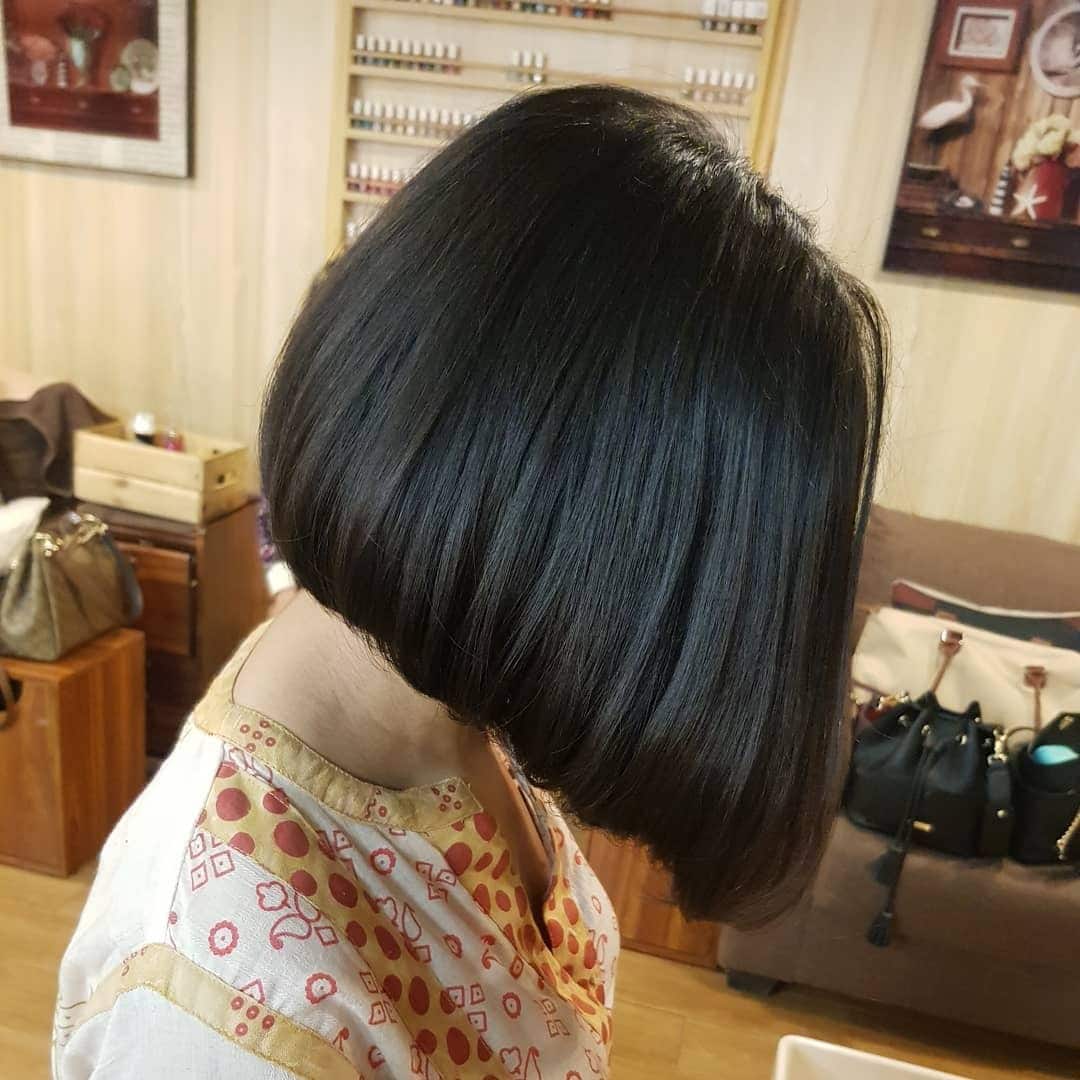 4. Midnight Sleek Angled Bob - Angled Bob Hairstyles