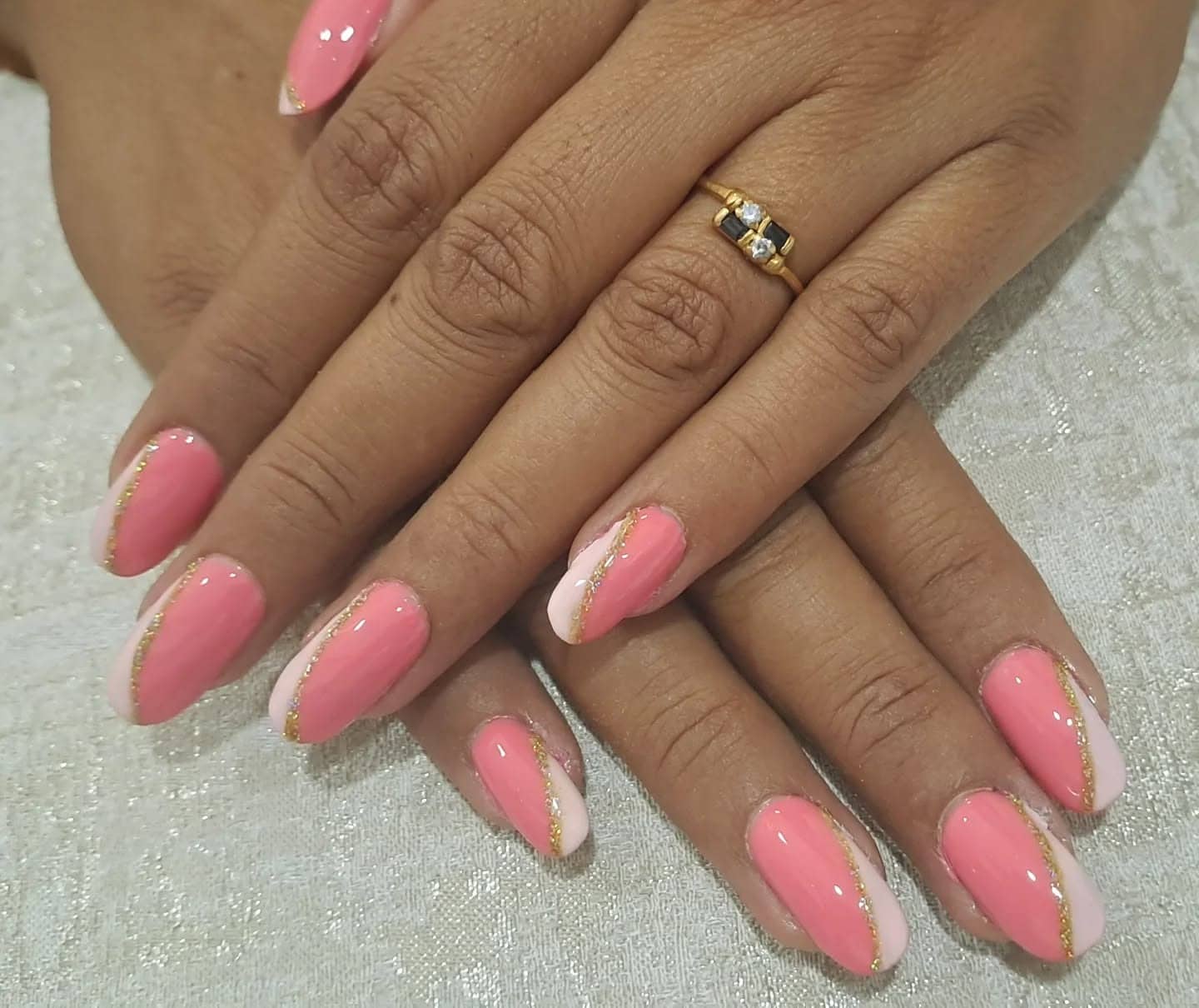 4. Rosy Divide with Gold Accent - half nail ideas
