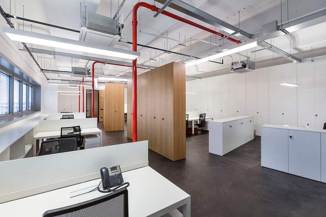 10. Crisp Contemporary Functionality - open space office ideas