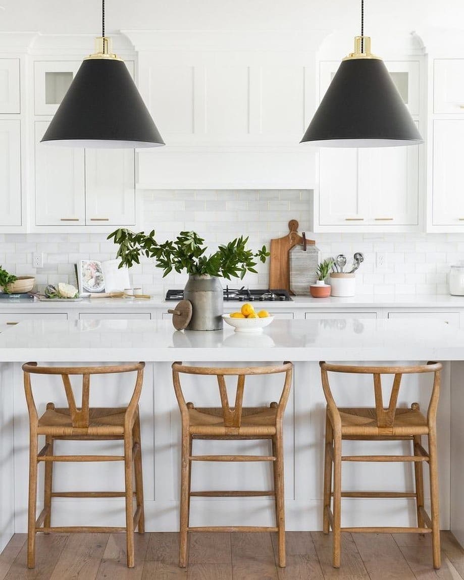 1. Modern Farmhouse Charm in White and Wood - kitchen lighting ideas