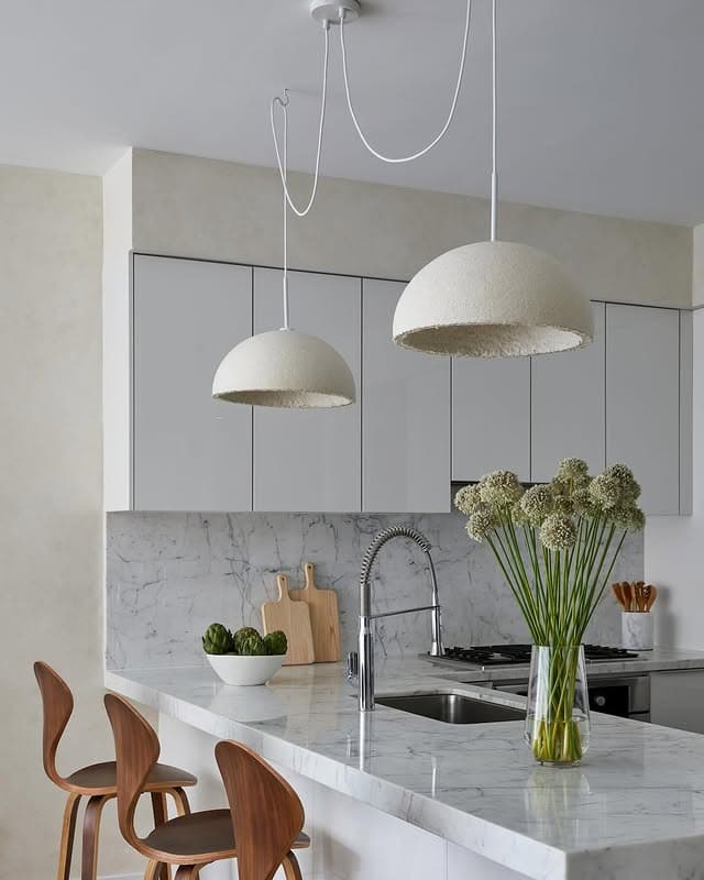 8. Organic Modern with Sculptural White Pendants - kitchen lighting ideas