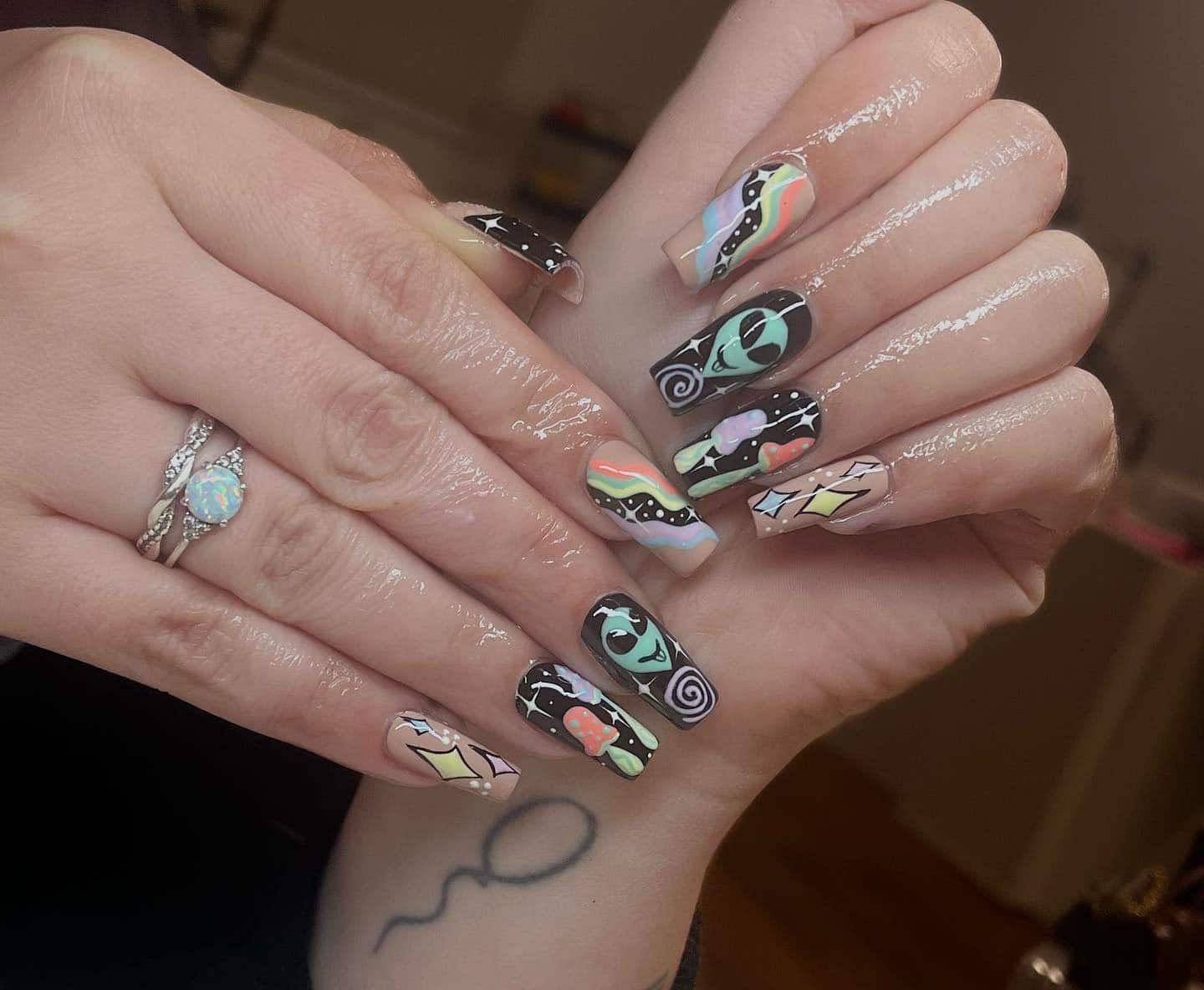 8. Cosmic Alien Pop Nails - hippie nail ideas