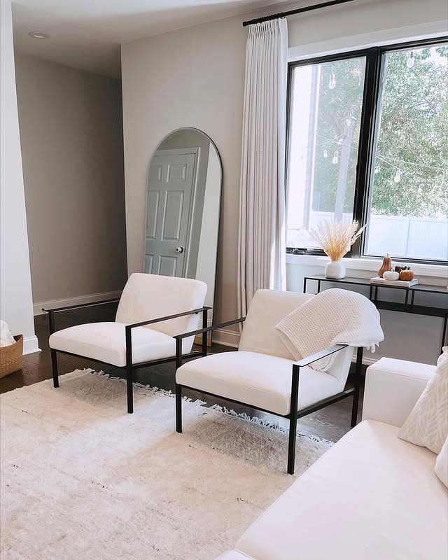 3. Light and Airy Simplicity - black and cream living room ideas