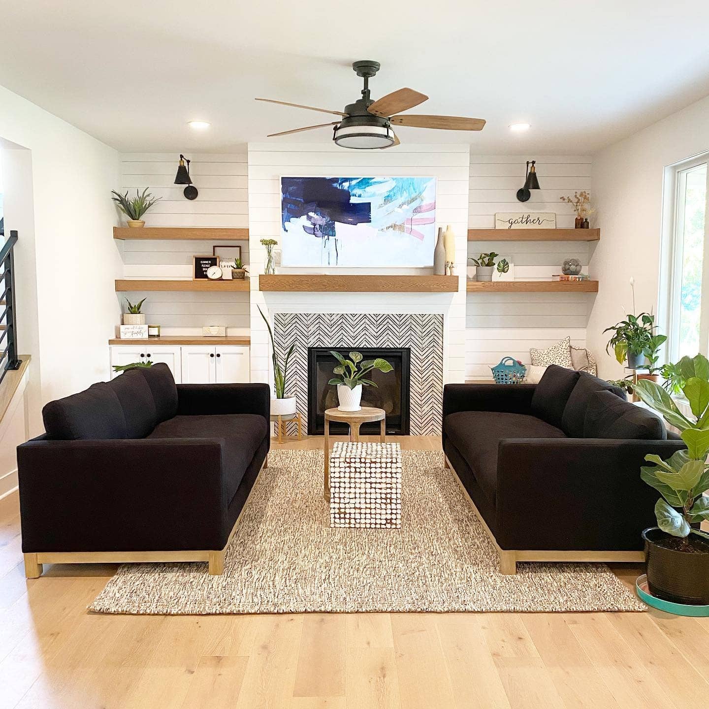 4. Warm Contrast with Structured Elegance - black and cream living room ideas