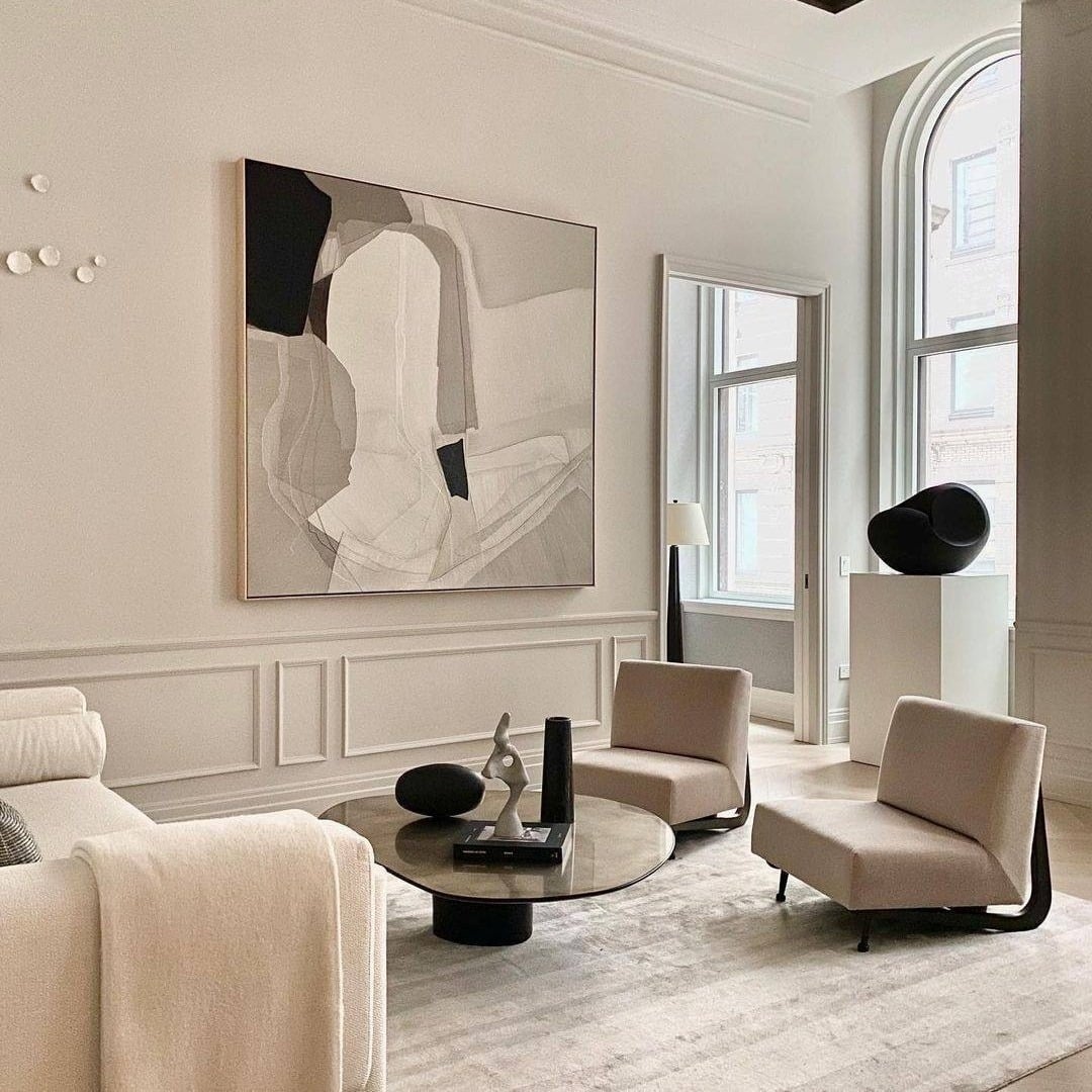 7. Artful Monochrome Sophistication - black and cream living room ideas